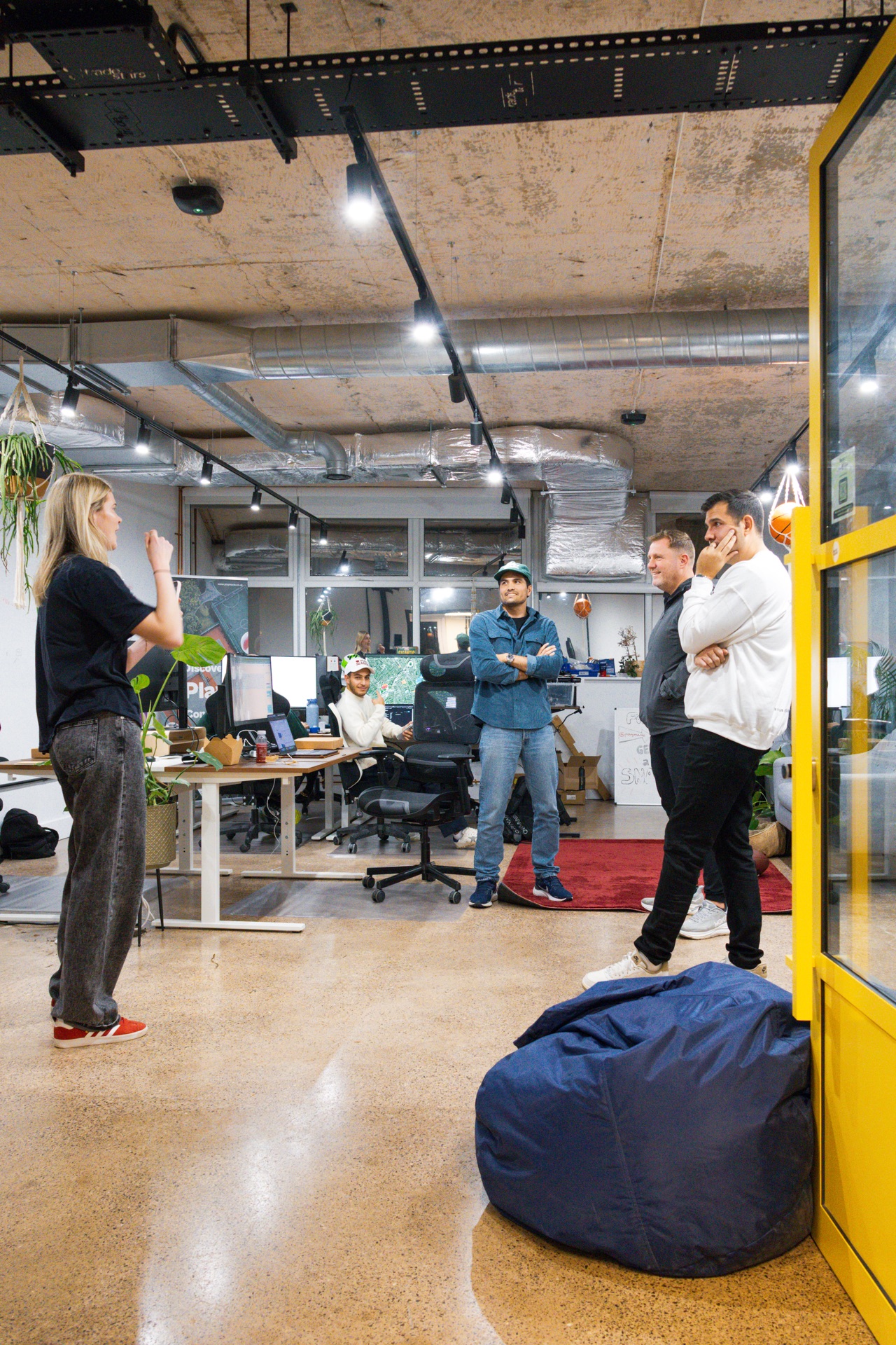 PlayMade team meeting in their office space